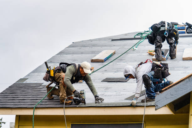 Professional Roofing technician working in Long Beach, NY